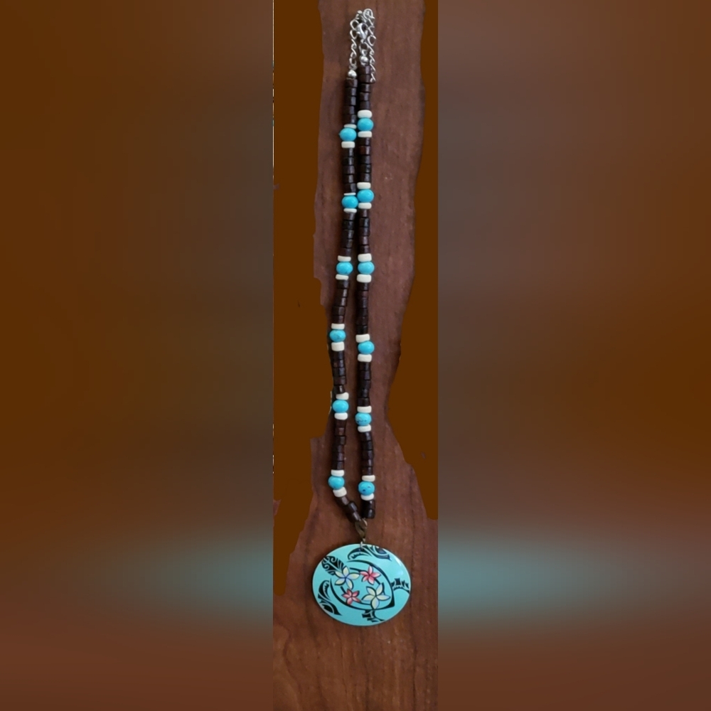 Handcrafted Beaded Necklace with Floral Pendant